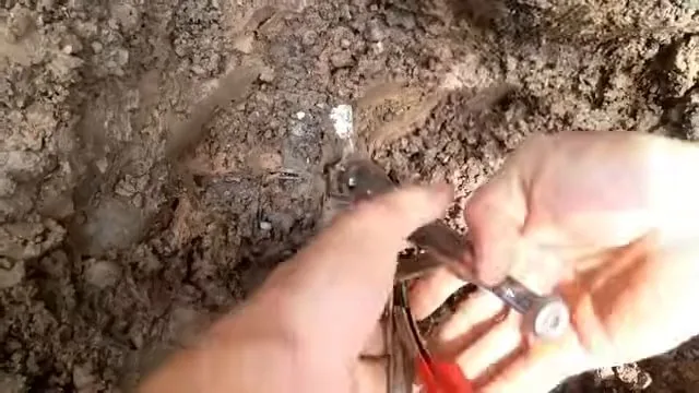 Cutting damaged underground pipe end, part of a shutting off your water main visit in Chapel Hill, NC