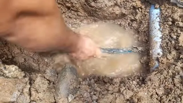 A look at muddy ground around burst water line from a recent before the plumber arrives visit